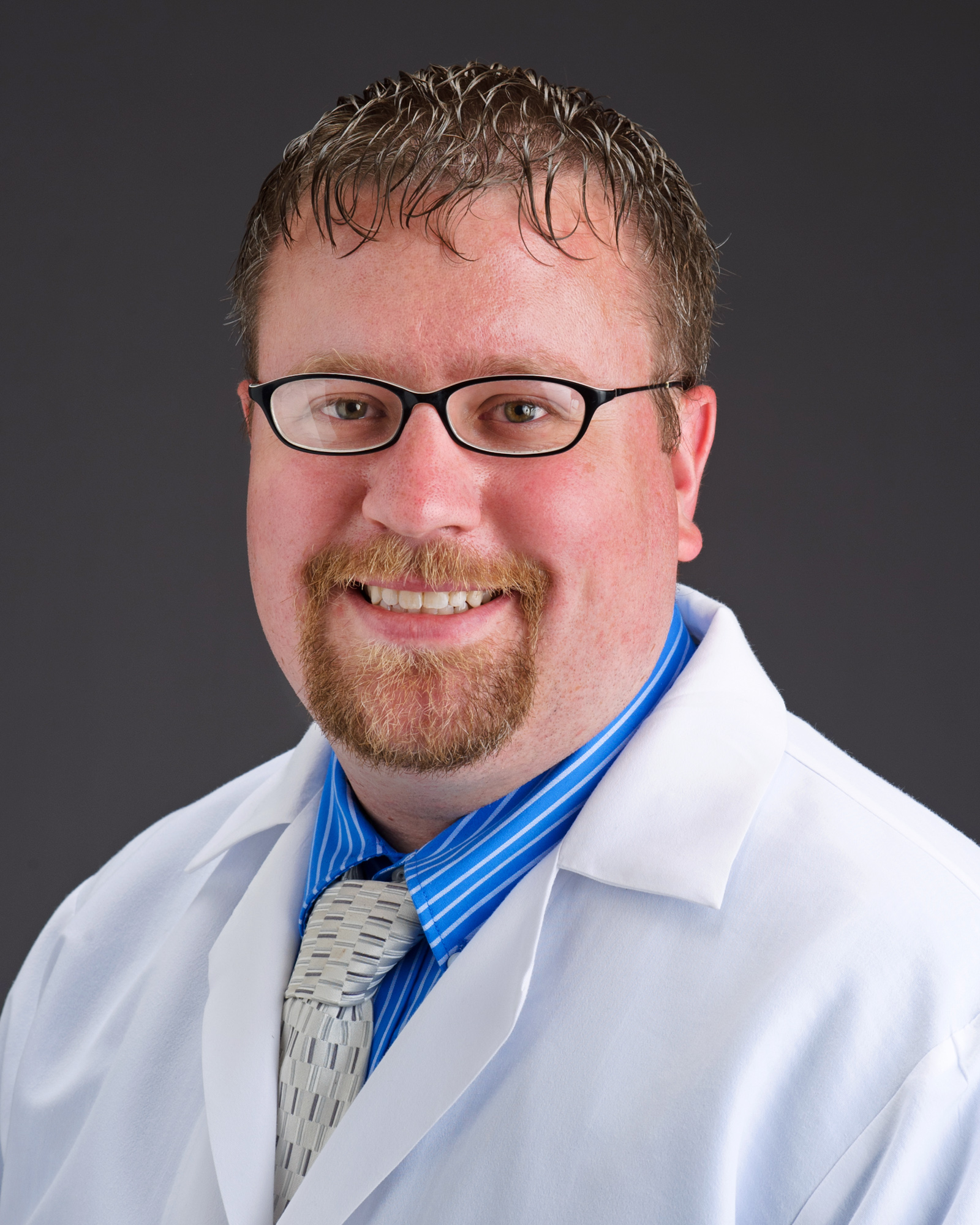 Portrait of Dr. Clayton Butcher